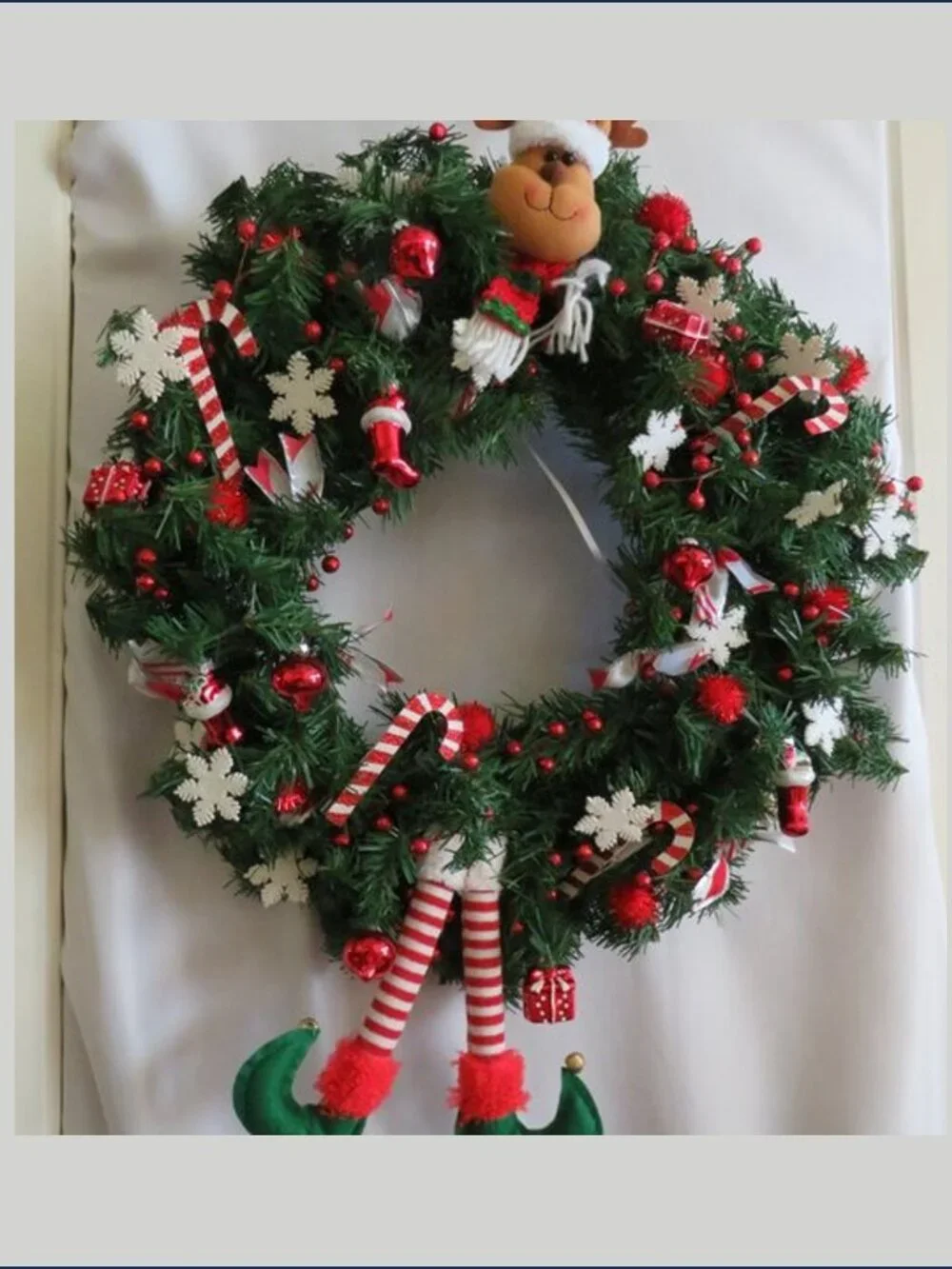 Whimsical Festive Christmas Wreath with Plush Reindeer Head & Elf Legs 21